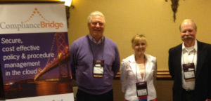 John Custer with ComplianceBridge; Lynda Lloyd with North West Arkansas Community College; and Bill Harrison, CEO of ComplianceBridge at the 2016 ACUPA Conference